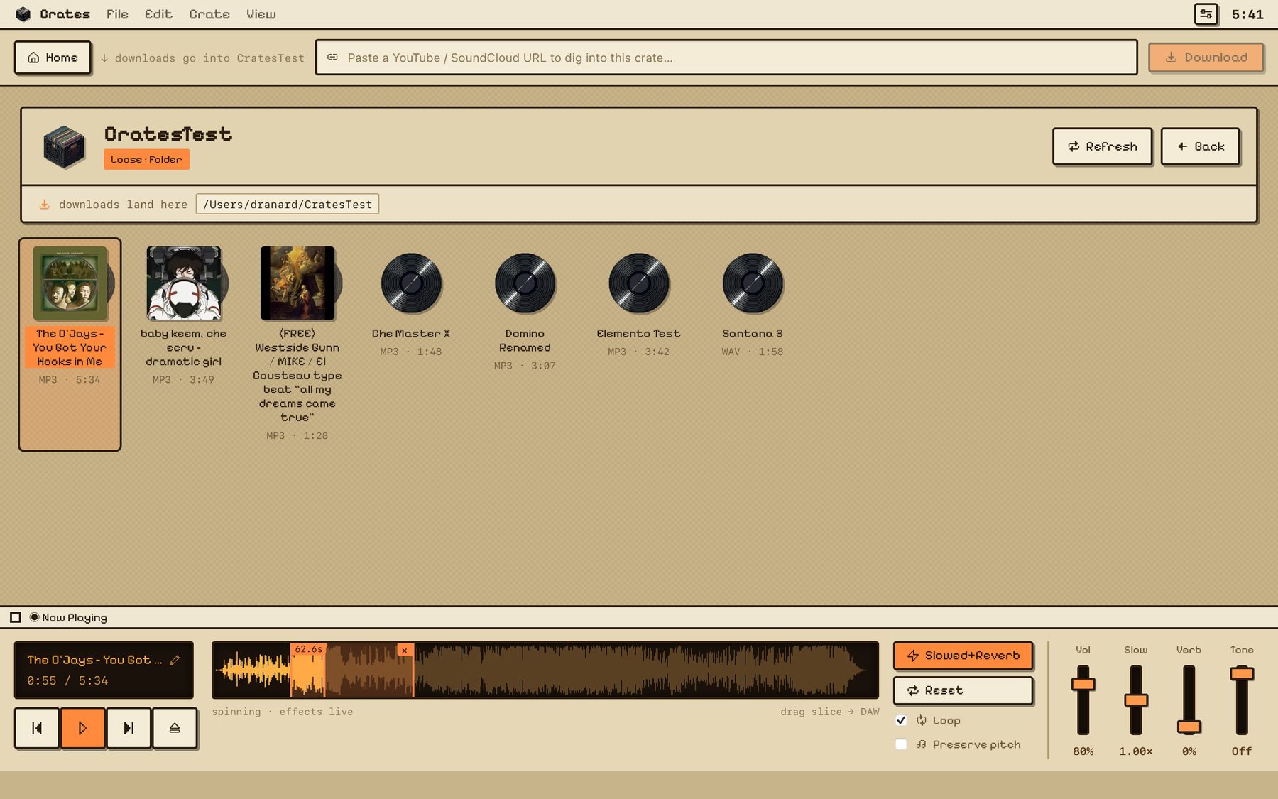 The Crates app — a library of samples shown as records with cover art, and a built-in player deck with waveform, effects, and faders